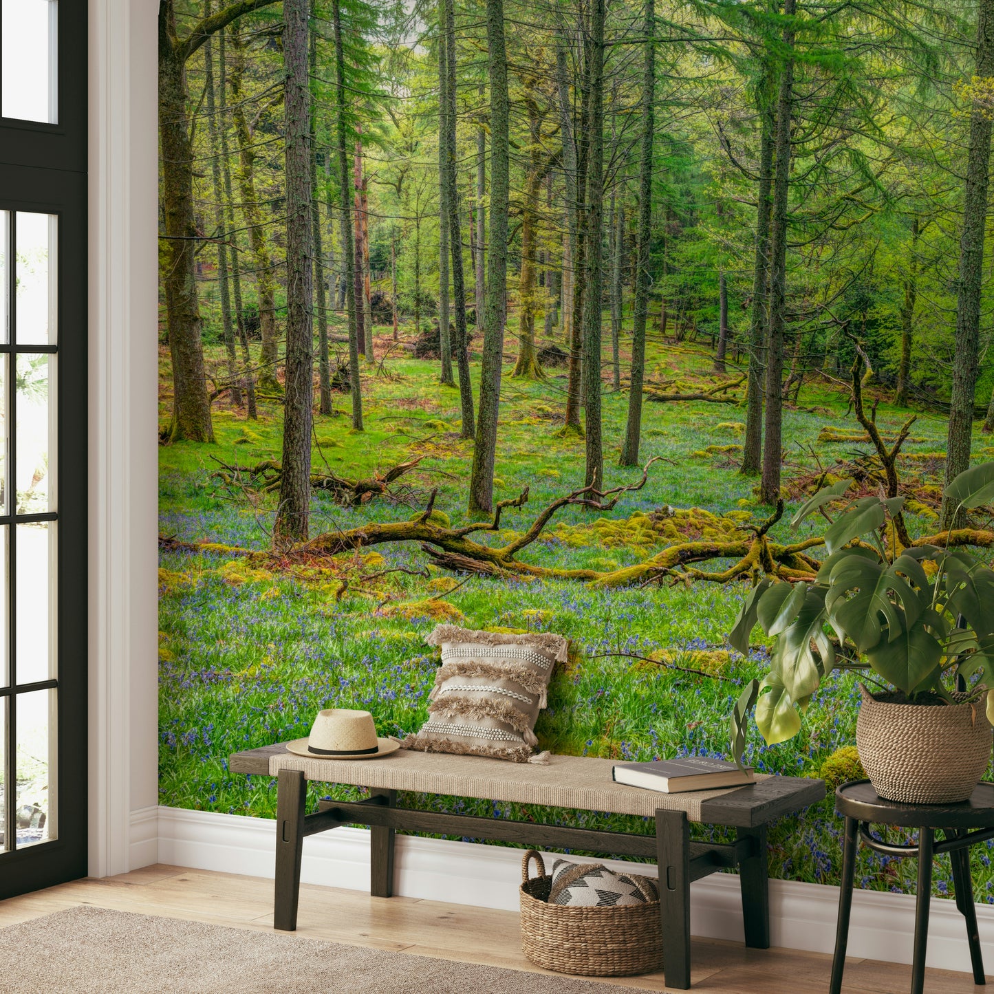Bedroom with woodland wall decor.

