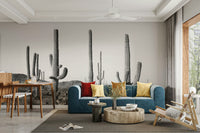 Silhouette of saguaro cacti.

