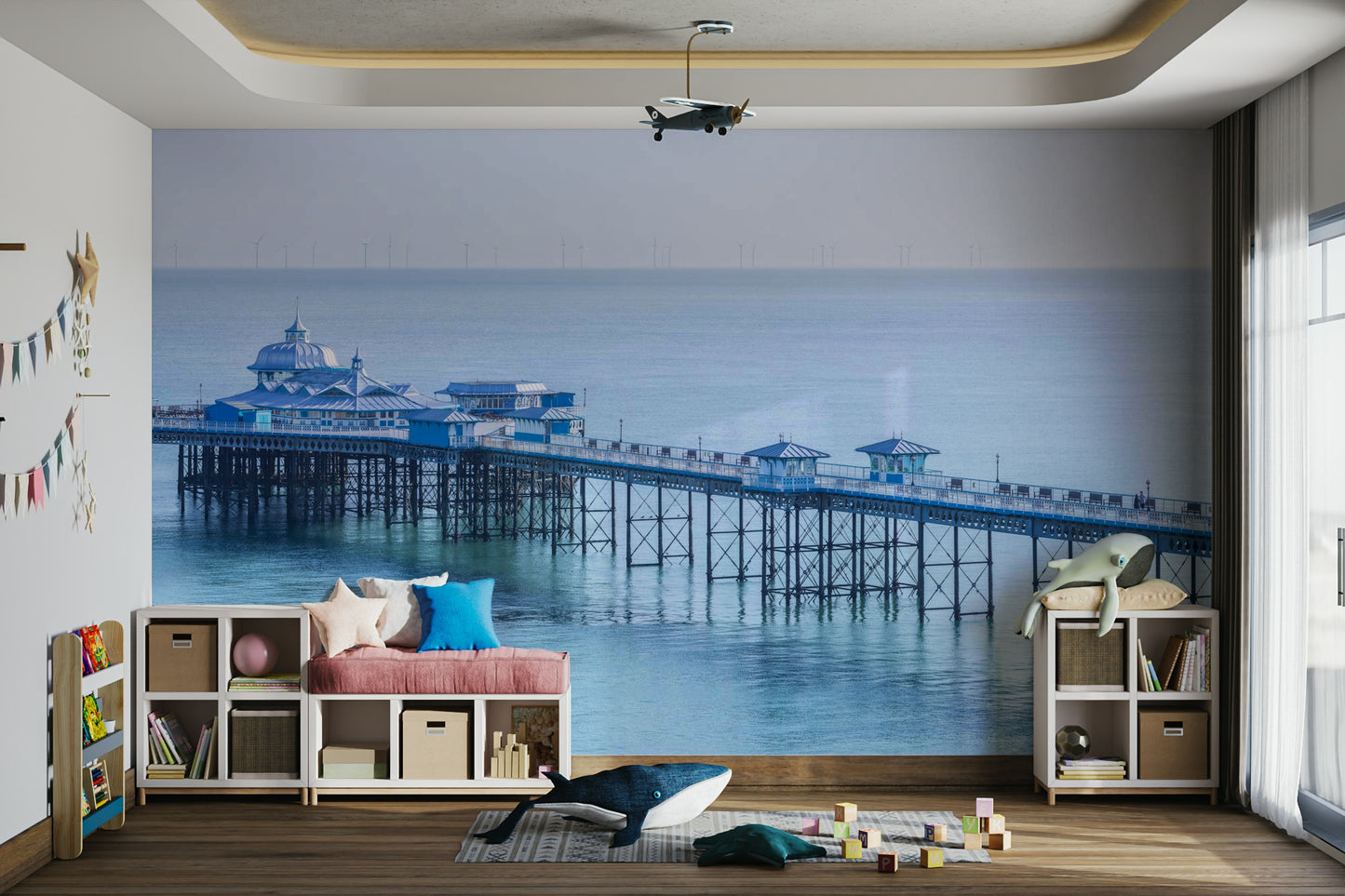 Intricate ironwork of the pier structure.

