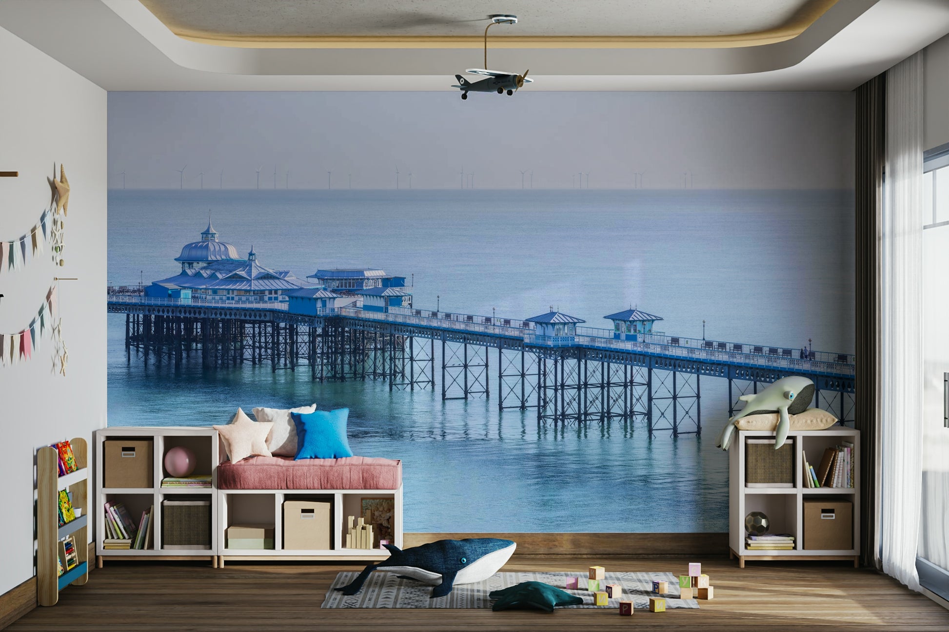 Intricate ironwork of the pier structure.

