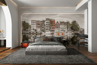 Clear reflections of the townhouses in the water.

