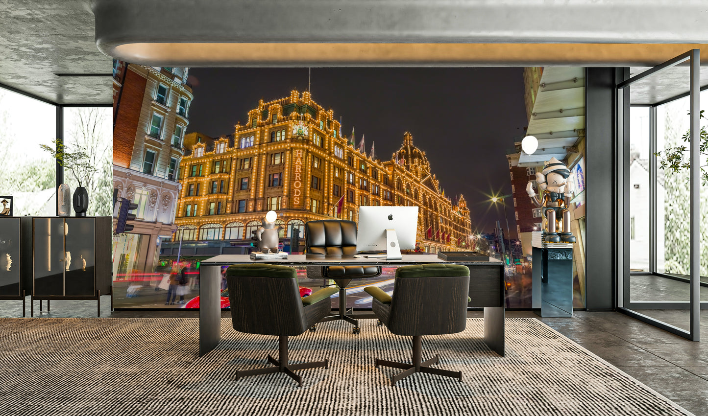 Illuminated Harrods department store at night.

