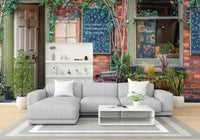 Bicycle parked by storefront mural
