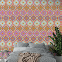 The design has a distinct 1970s or "mod" aesthetic, embodying "flower power."
