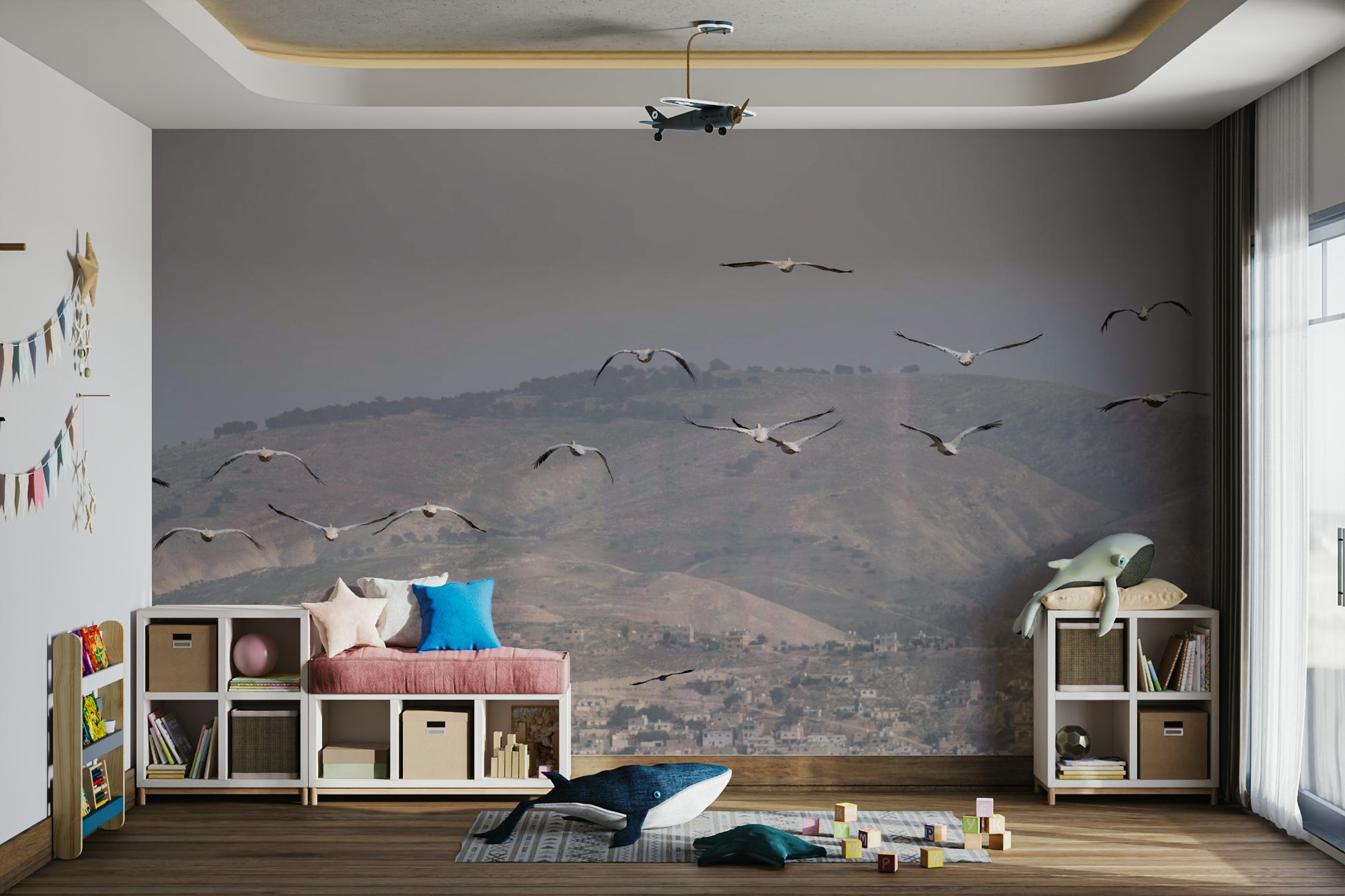 Birds are depicted soaring or flying in the sky above the hills.
