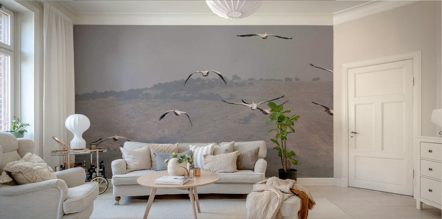 The style is artistic and often feels grand, serene, or painterly.
