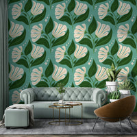 The color palette includes cream florals set against an avocado retro blue background.
