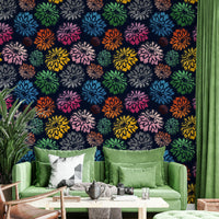 Wallpaper with a mix of pink, blue, green, and yellow floral motifs.

