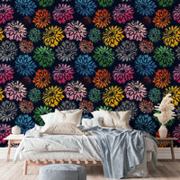 Design featuring dahlias in multiple colors on a navy blue background.

