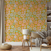Design featuring whimsical flowers in peach, light purple, and mint green.

