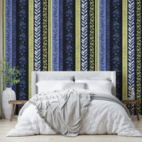 Seamless striped wallpaper with a mix of blue, yellow, and black.

