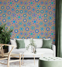 A close-up view of a wall mural with a repeating daisy pattern.

