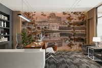 The castle and bridge are reflected in a calm river.

