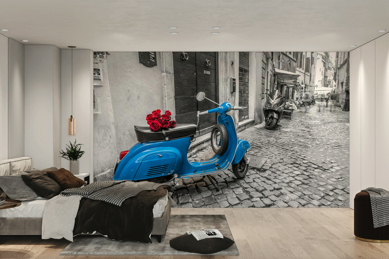 A wall mural of a vintage blue scooter.

