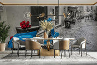 The scooter is the only vibrant color in the image.

