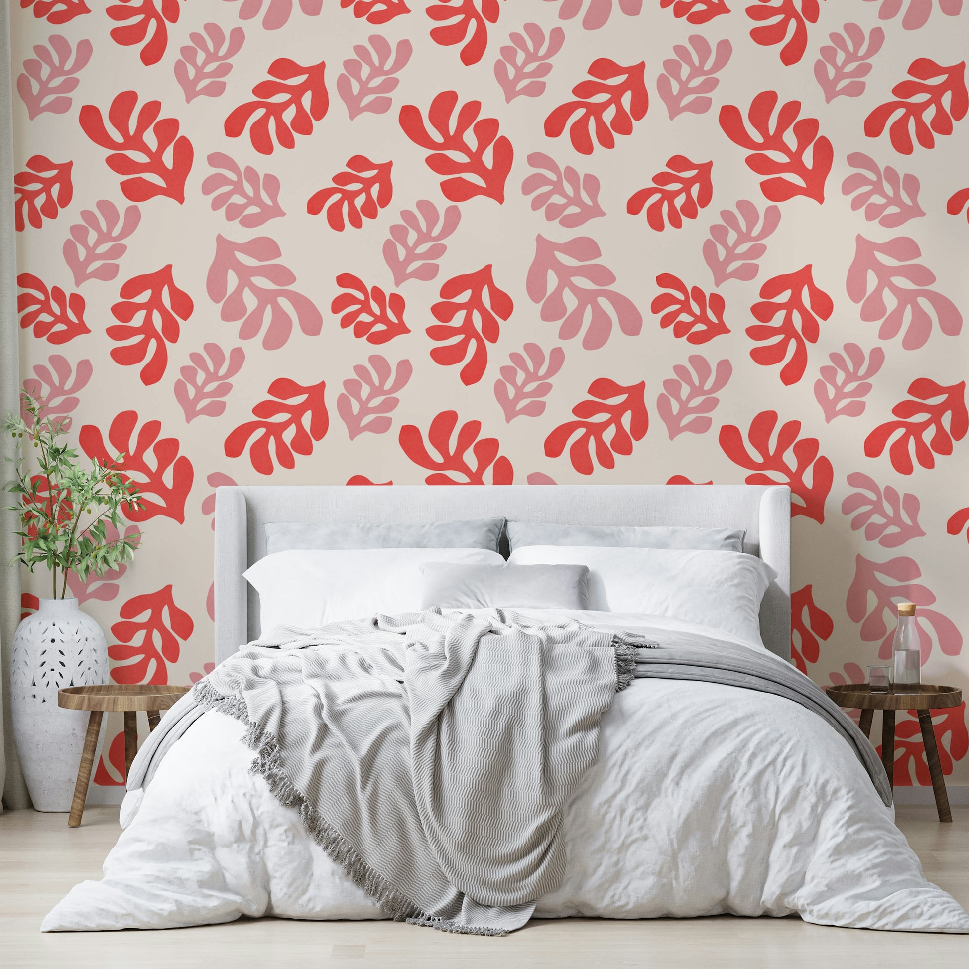A close-up view of a wallpaper with a cutout leaf pattern.

