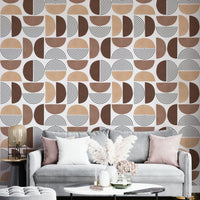 The wallpaper serves as a stylish backdrop for contemporary furniture.

