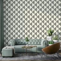 The pattern creates a sense of depth and movement on the wall.

