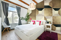 A velvet sofa is visible in front of the mural.

