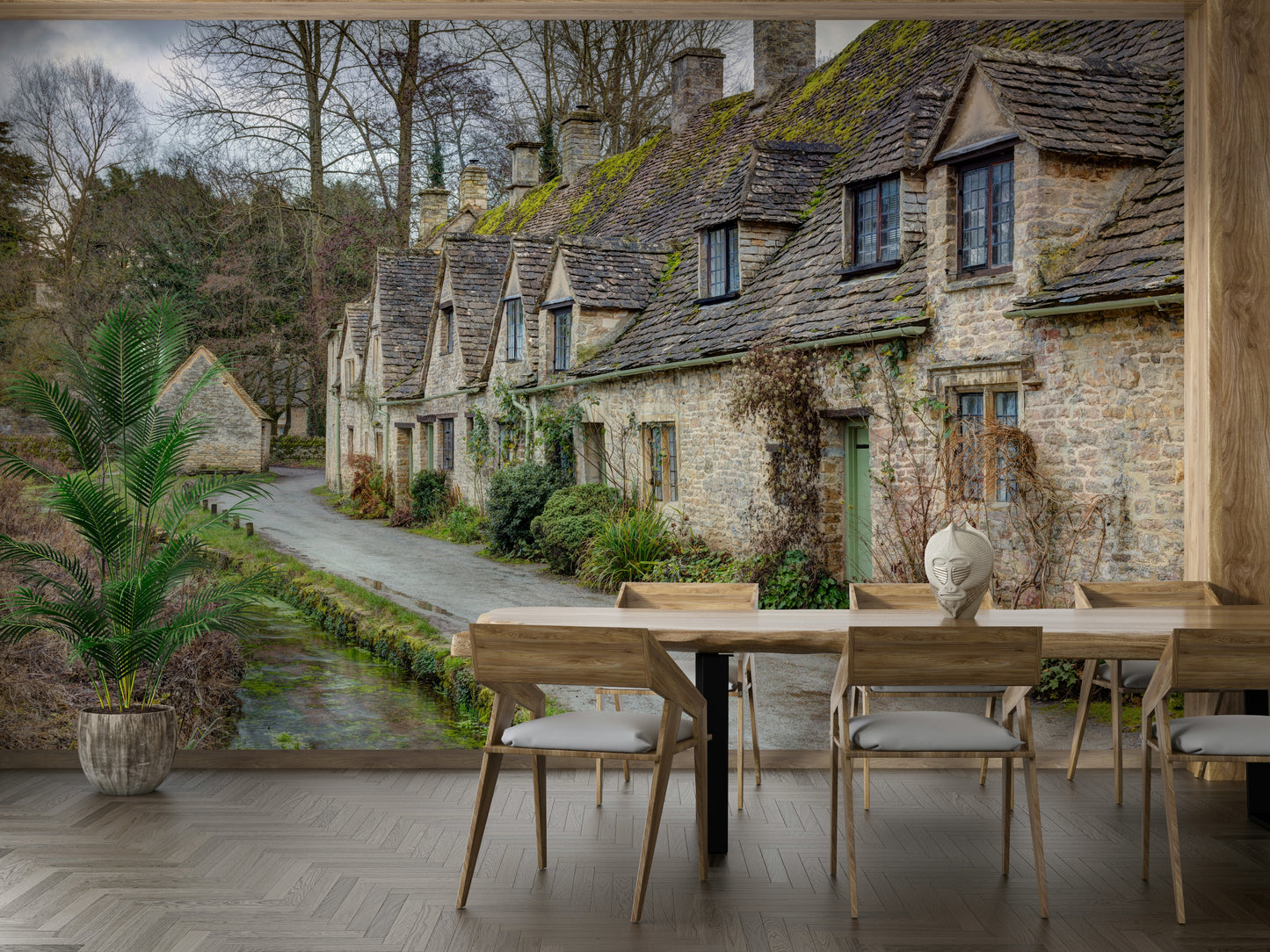 The roofs of the cottages are covered in green moss.

