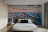 The sky is filled with soft, pastel-colored clouds.

