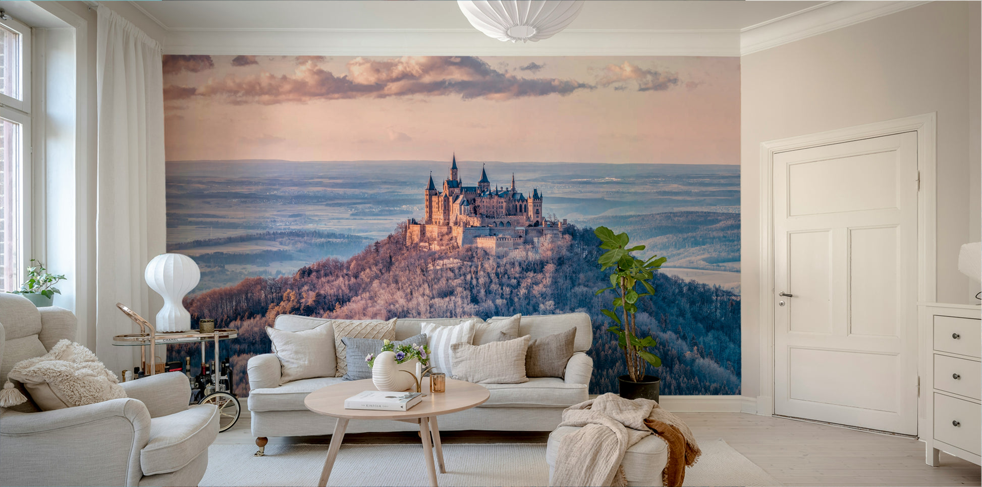 The mountain is surrounded by a frosted forest.

