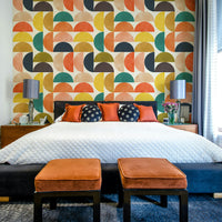 The colors are soft, muted tones of mustard yellow, avocado green, burnt orange, and muted brown.

