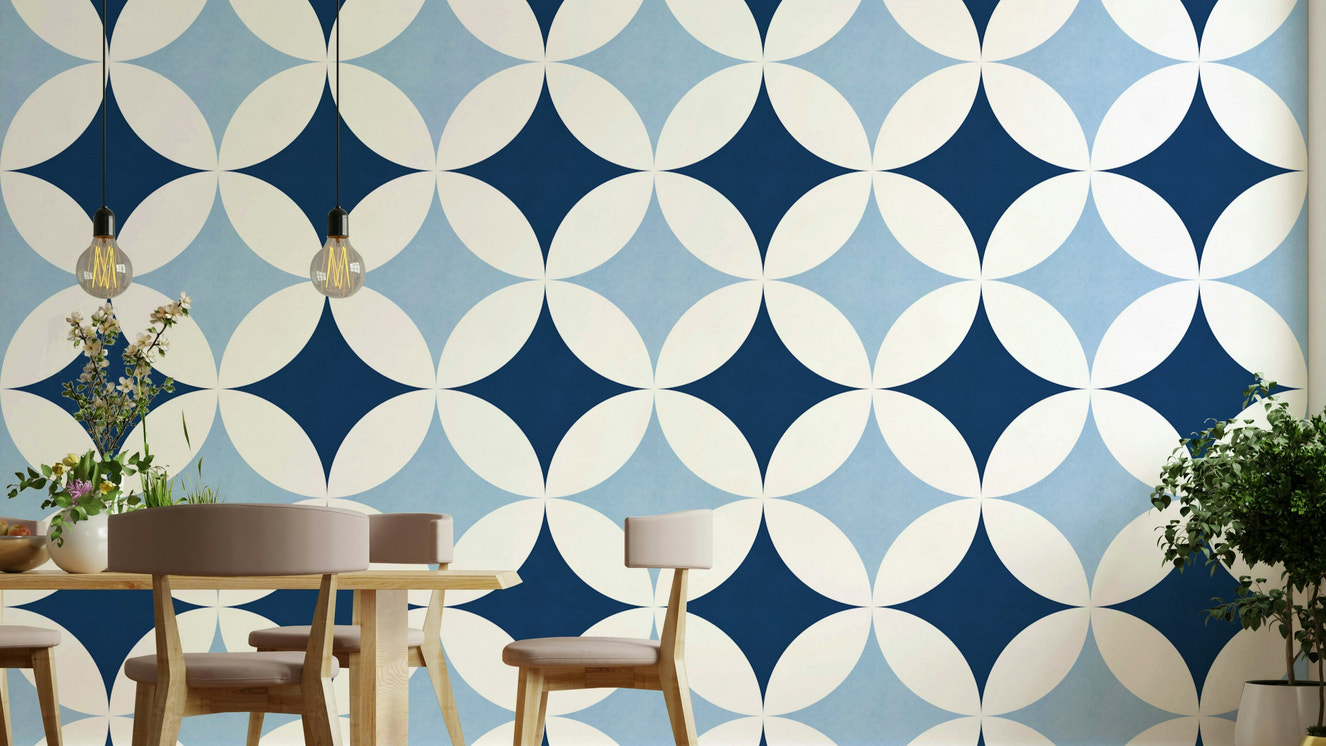 A wall mural of a peaceful celestial pattern.

