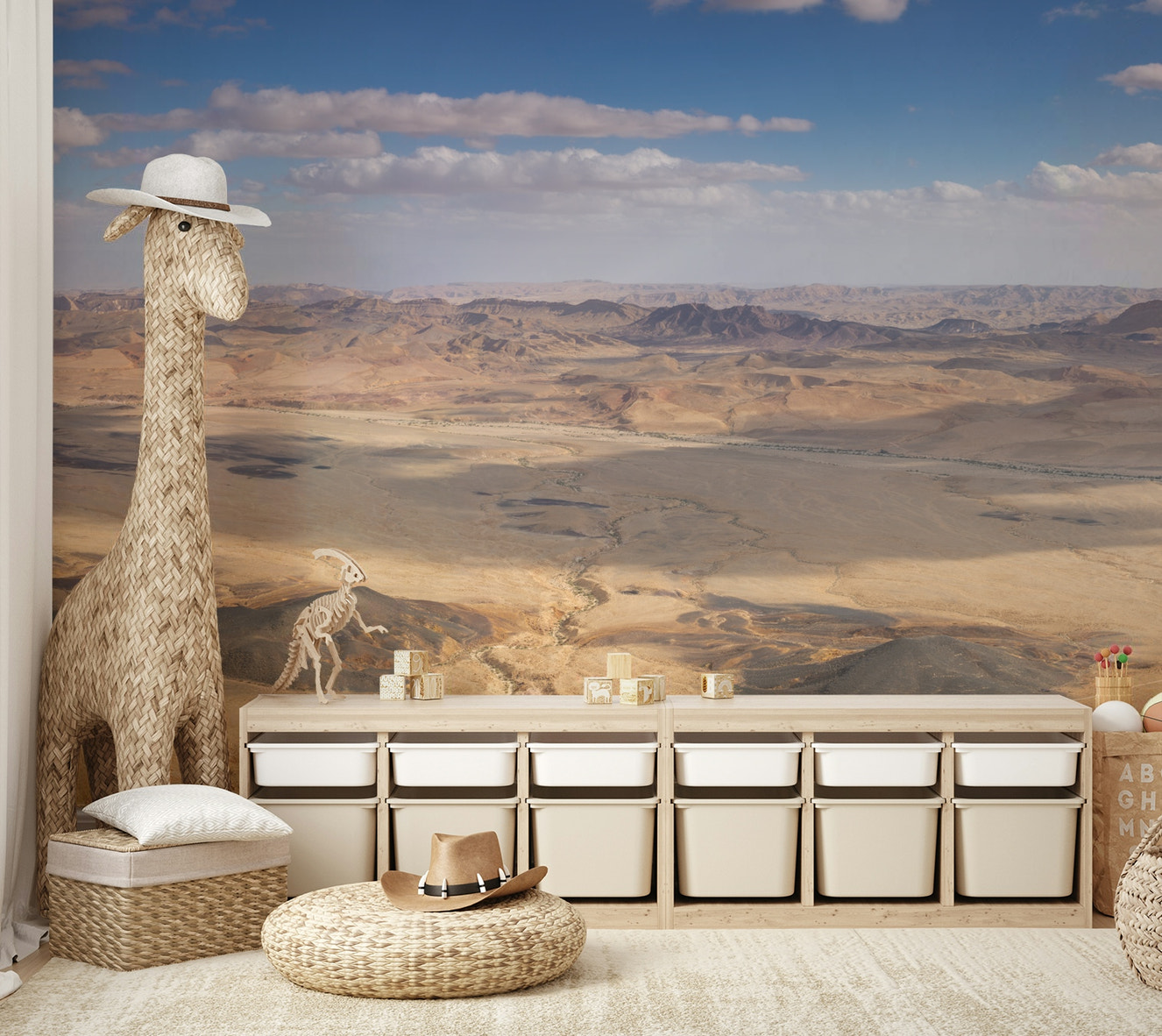A wall mural of a panoramic desert view.

