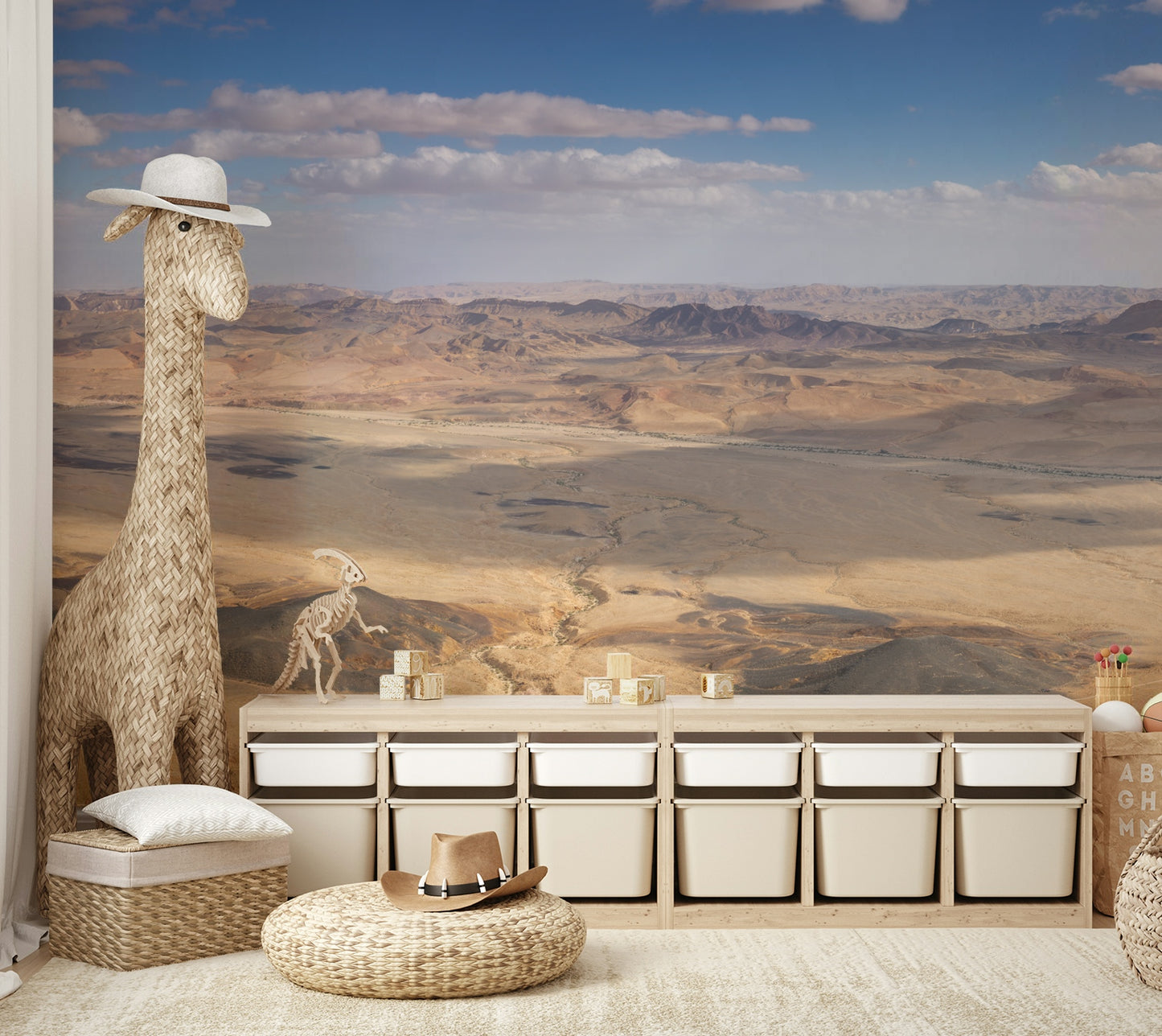 A wall mural of a panoramic desert view.

