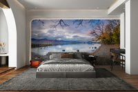 There are some tree branches in the water in the foreground.

