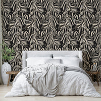 A wallpaper design with a zebra herd.

