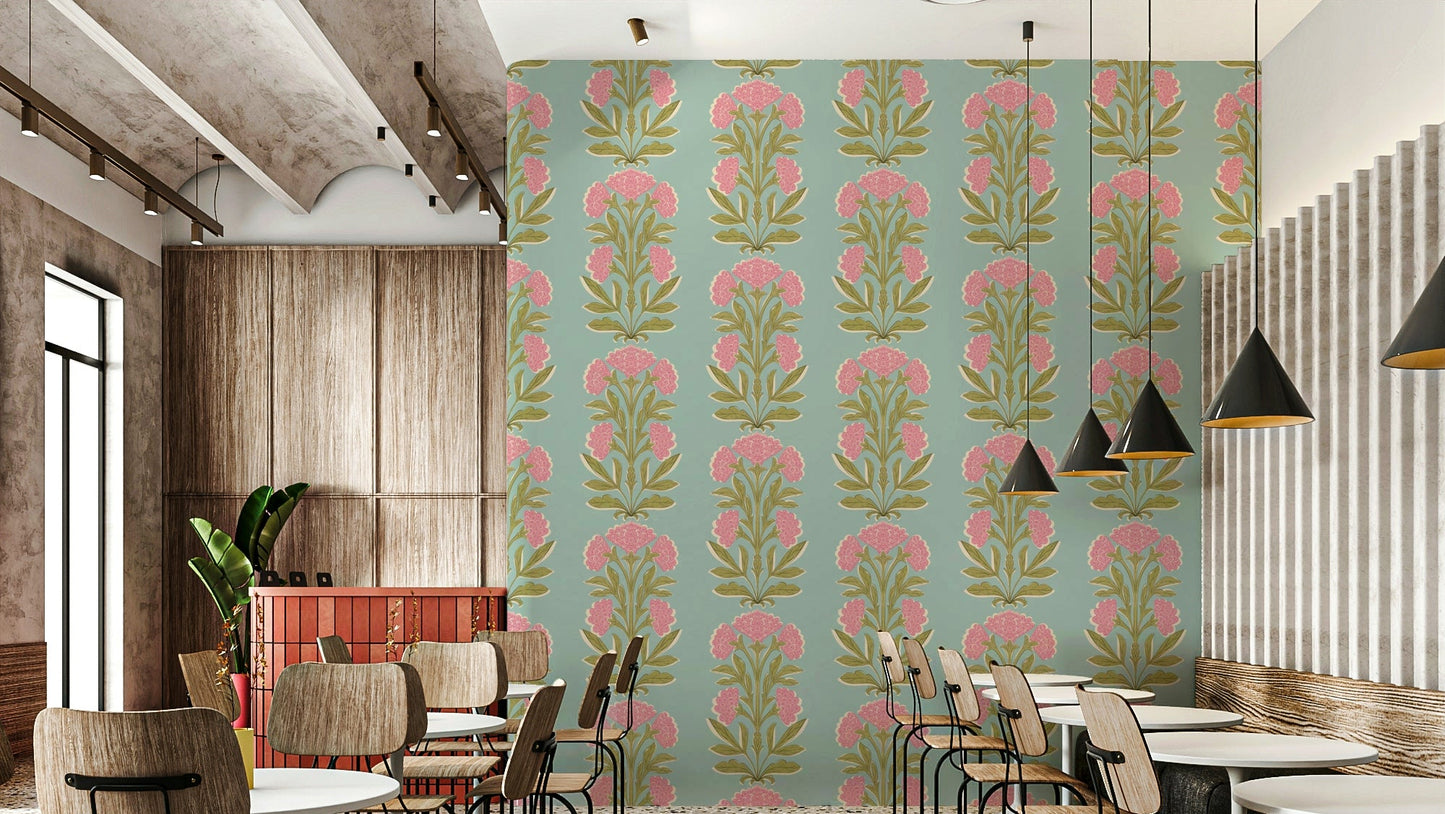 A wall mural of a symmetrical floral and leaf pattern.


