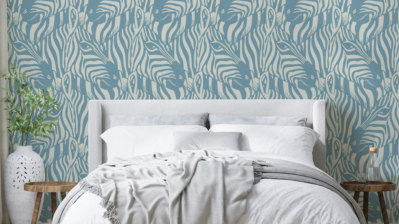 The colors are soft, muted tones of pastel blue and light gray.

