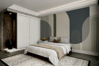 A wall mural of a geometric arch pattern.

