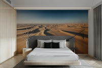 The desert landscape is a central focus of the image.

