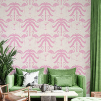 The palm leaves and flamingos are a central focus of the image.

