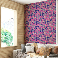 The room's lighting highlights the vibrant feel of the mural.

