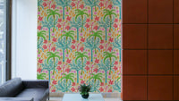 A wall mural featuring a bold, tropical floral and botanical pattern.

