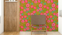 A wall mural featuring a bold, tropical floral pattern.


