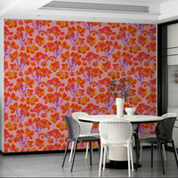 A wall mural featuring a bold, abstract floral pattern.

