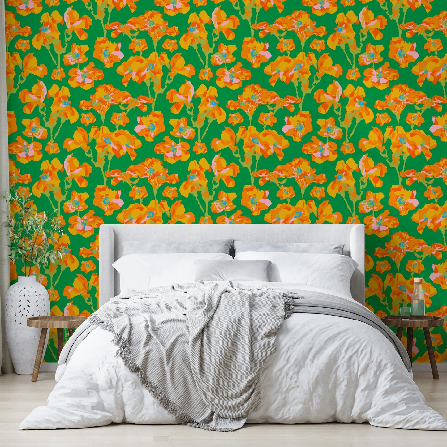 The image shows a full wall with a pattern of wild roses and leaves.

