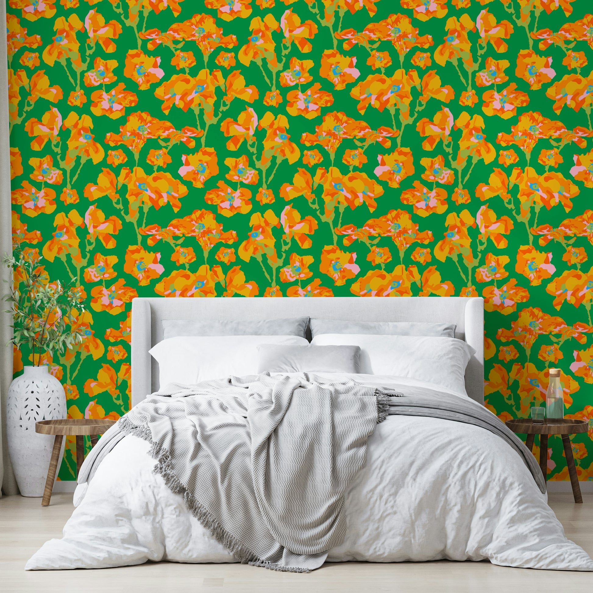 The image shows a full wall with a pattern of wild roses and leaves.

