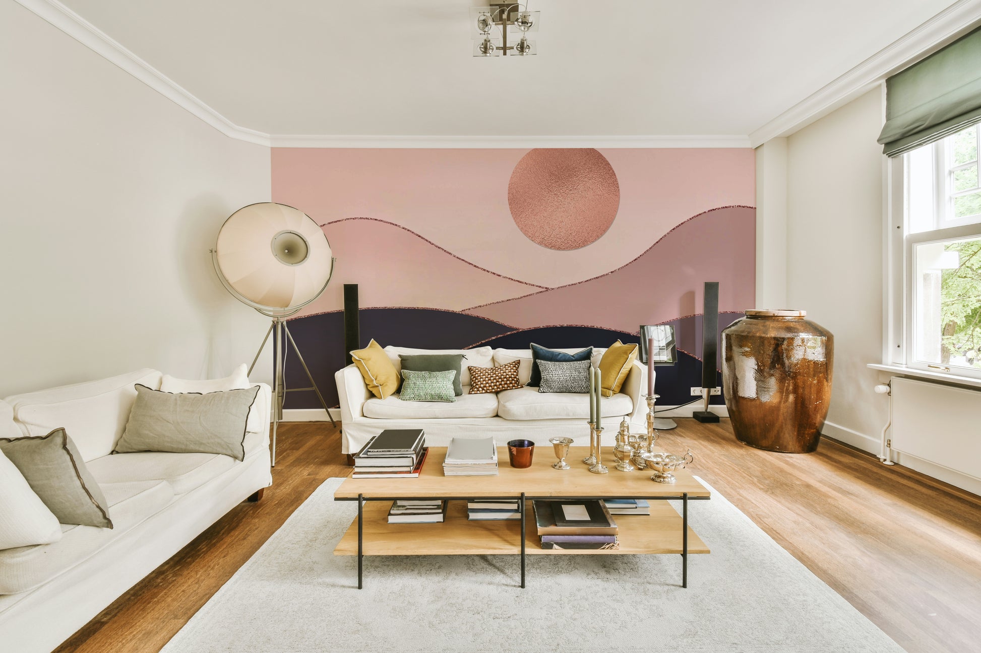 The colors are soft, muted tones of rose gold, pink, and copper.

