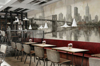 The scene includes a perfect reflection of the city in a body of water.

