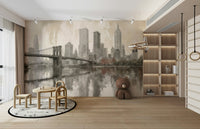 The skyline is seen at night, with many bright, soft lights.
