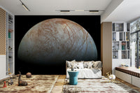 The background is a deep, dark space with distant stars.
