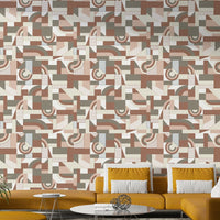 The mural is installed in a calm living room behind a simple, light-colored sofa.

