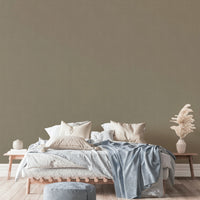 The wallpaper is installed in a modern, minimalist living room.

