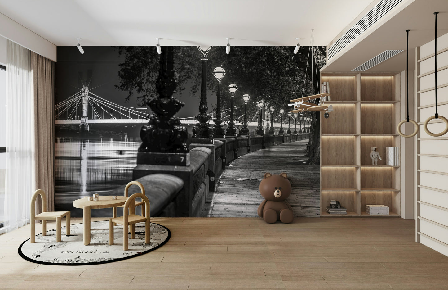 The lights from the bridge and lamps reflect on the water.

